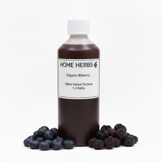A 500ml bottle of Home Herbs Organic Bilberry herbal tincture, 1:2 ratio, shown with fresh blueberries and dried bilberry berries on a clean white background.