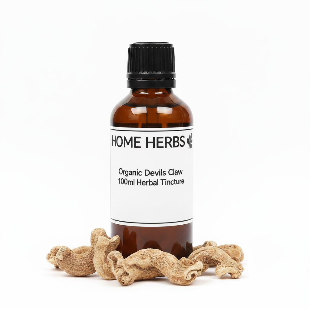 An amber glass bottle of Home Herbs Organic Devils Claw 100ml Herbal Tincture with a black cap and white label, styled with dried roots in front on a white background.